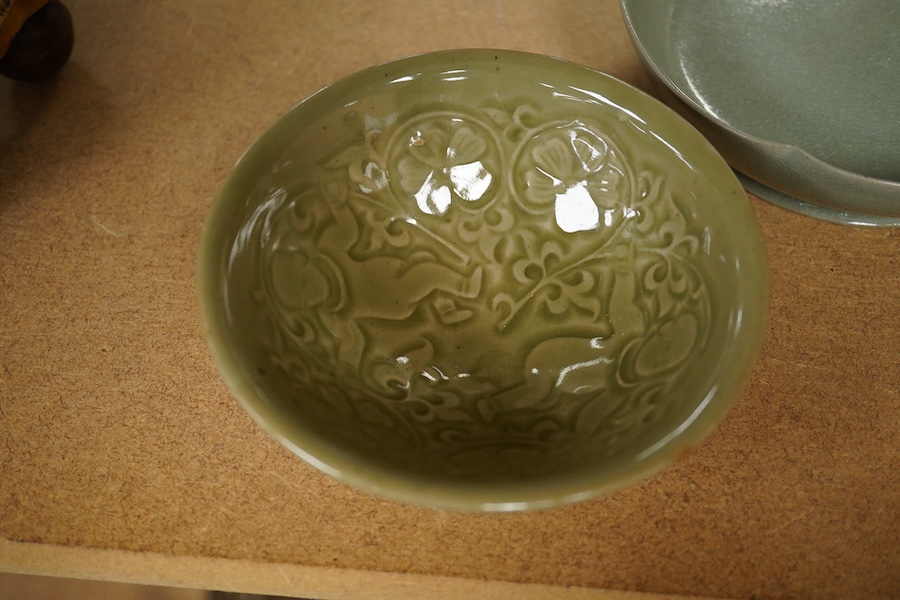 A Chinese celadon glazed box and cover and two similar bowls, largest 15cm diameter. Condition - varies